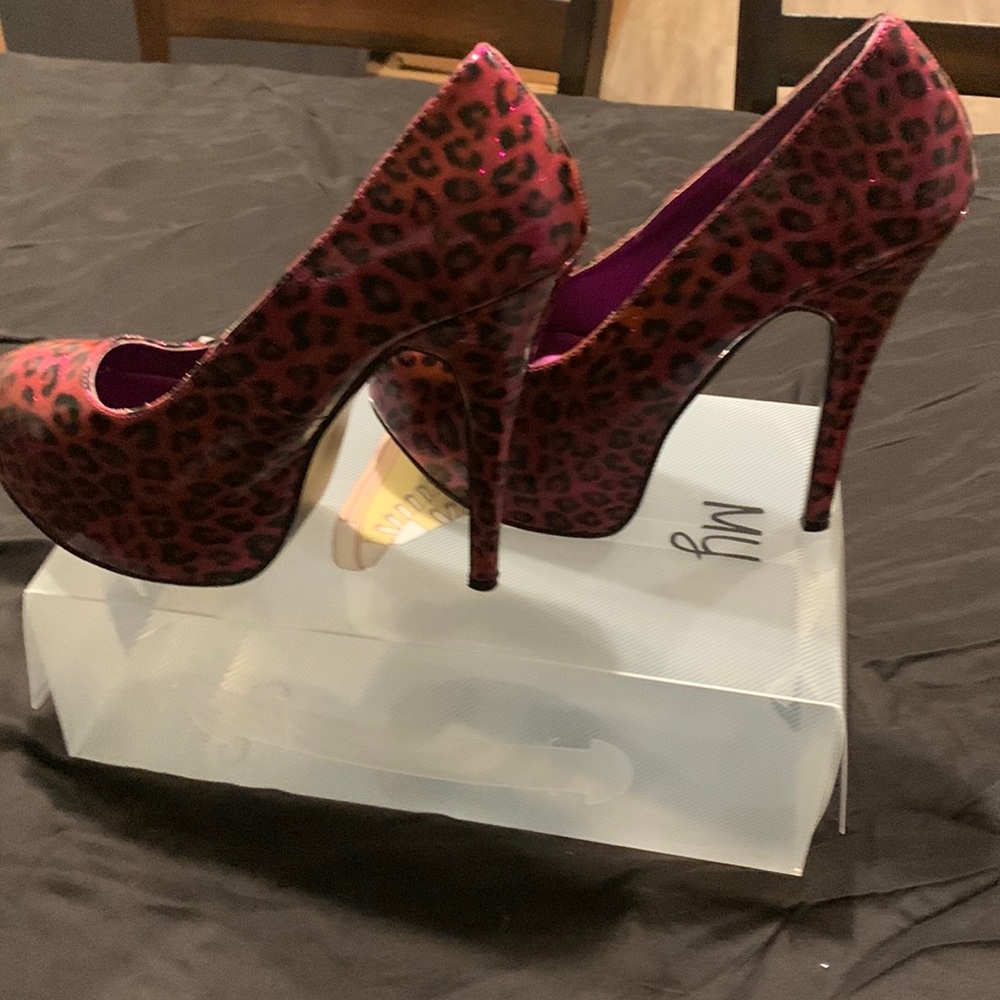 A Bordello design. Hot pink sparkle with black animal print. Size 8